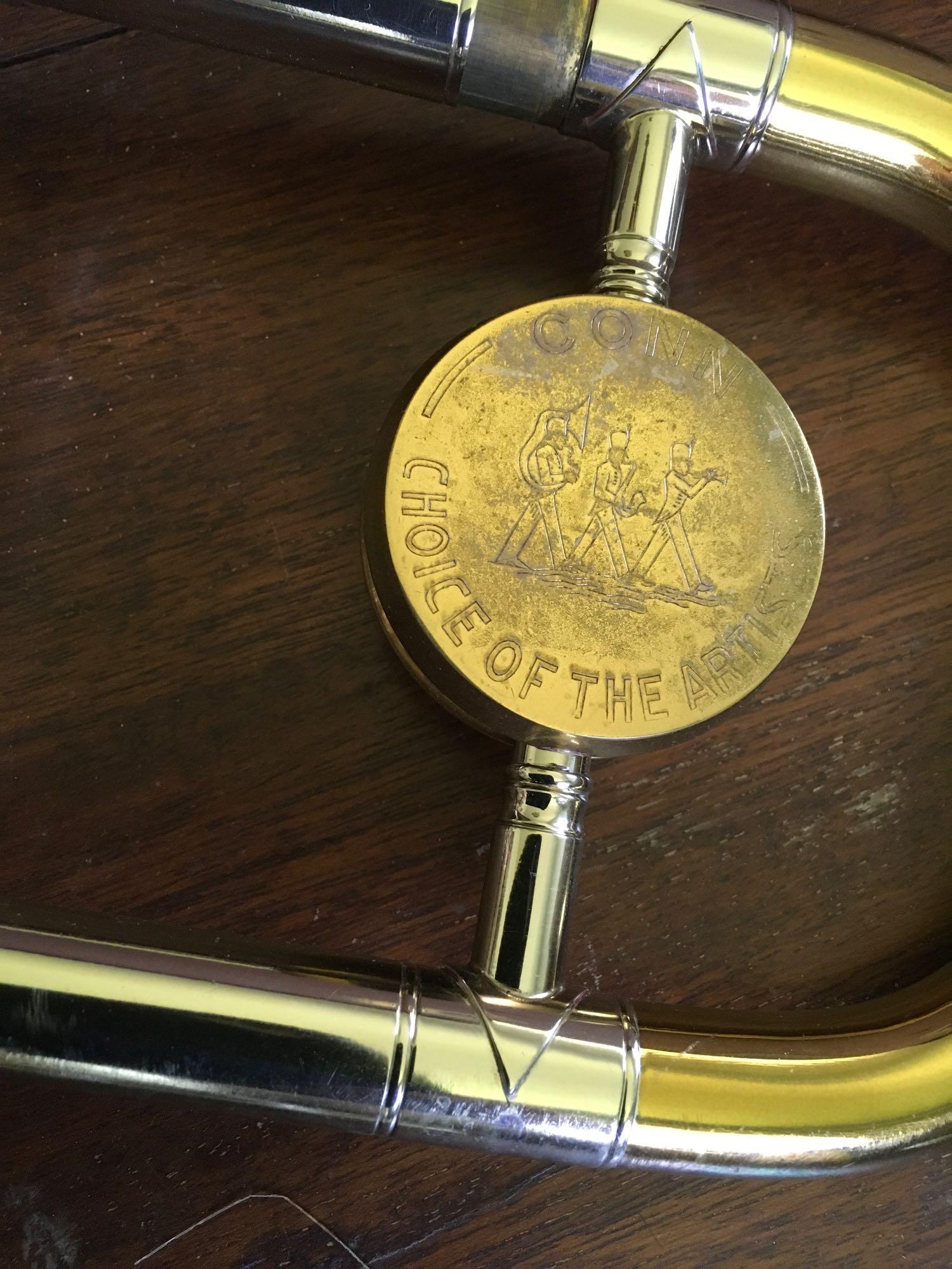 C.G. Conn Trombone Ser. #349013 has Engraved 7" Bell, some minor dents, accessories, West Craft case