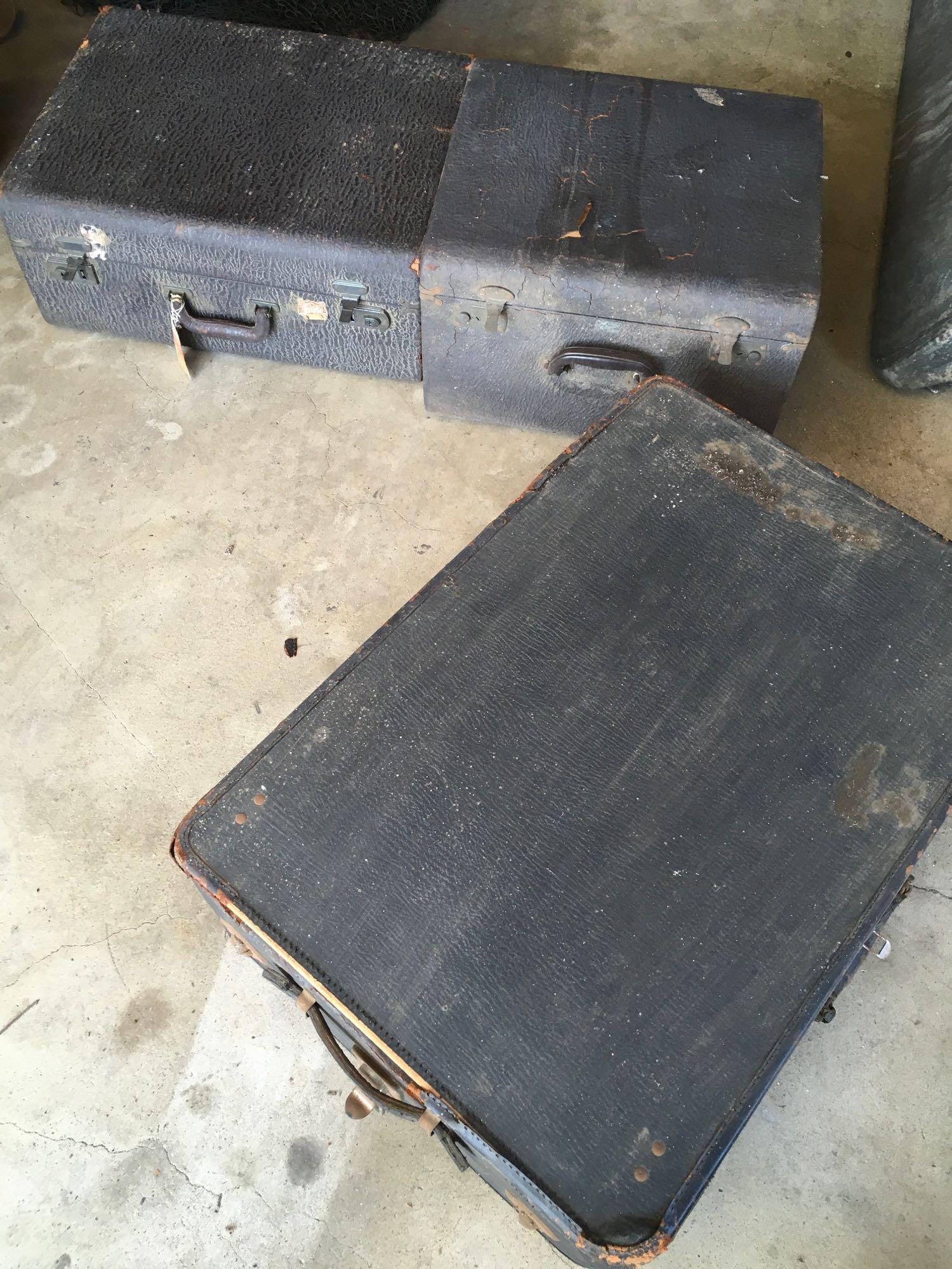 Vintage luggage. One has tag Multnoman Hollywood Luggage