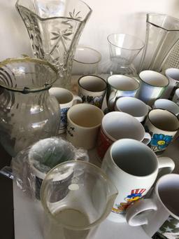 Lot. Assorted coffee mugs, glass pitcher, vases, etc