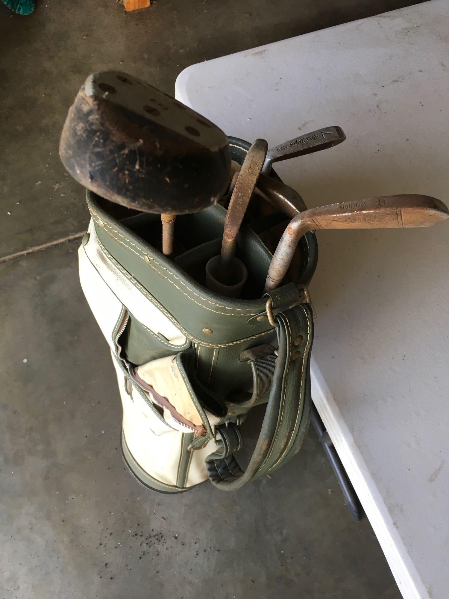 Vintage golf clubs with bag