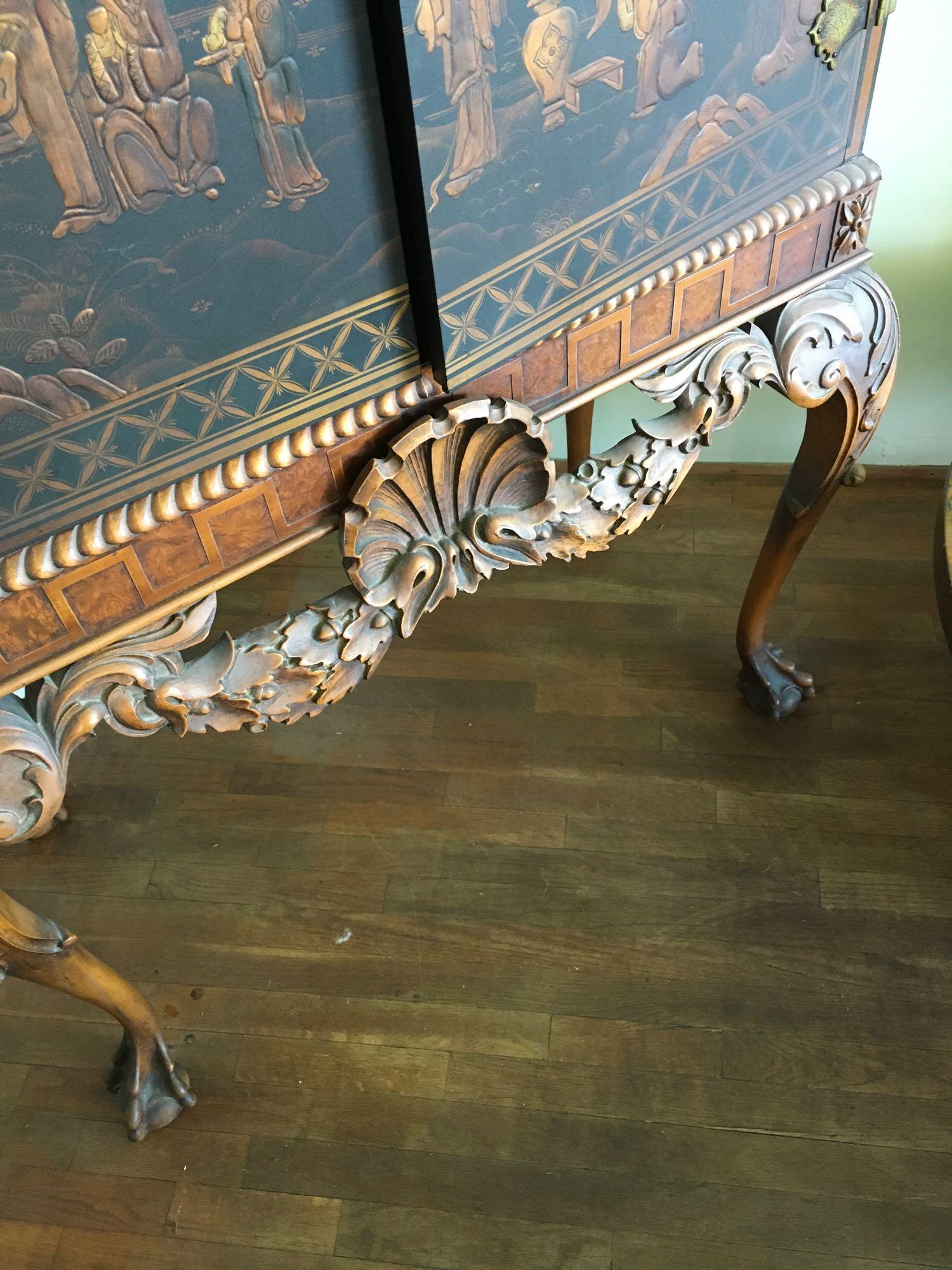 70" x 38" x 16" Vintage hand carved wood oriental cabinet with metal accents, with key.