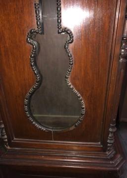 French Morbier Clock mounted in a later Mahogany case.