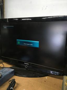 Samsung 40" TV with remote. Model LN-T405HA S. Turned on