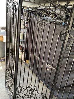 5 panel, foldable, decorative Iron gate. Heavy, 125" W total