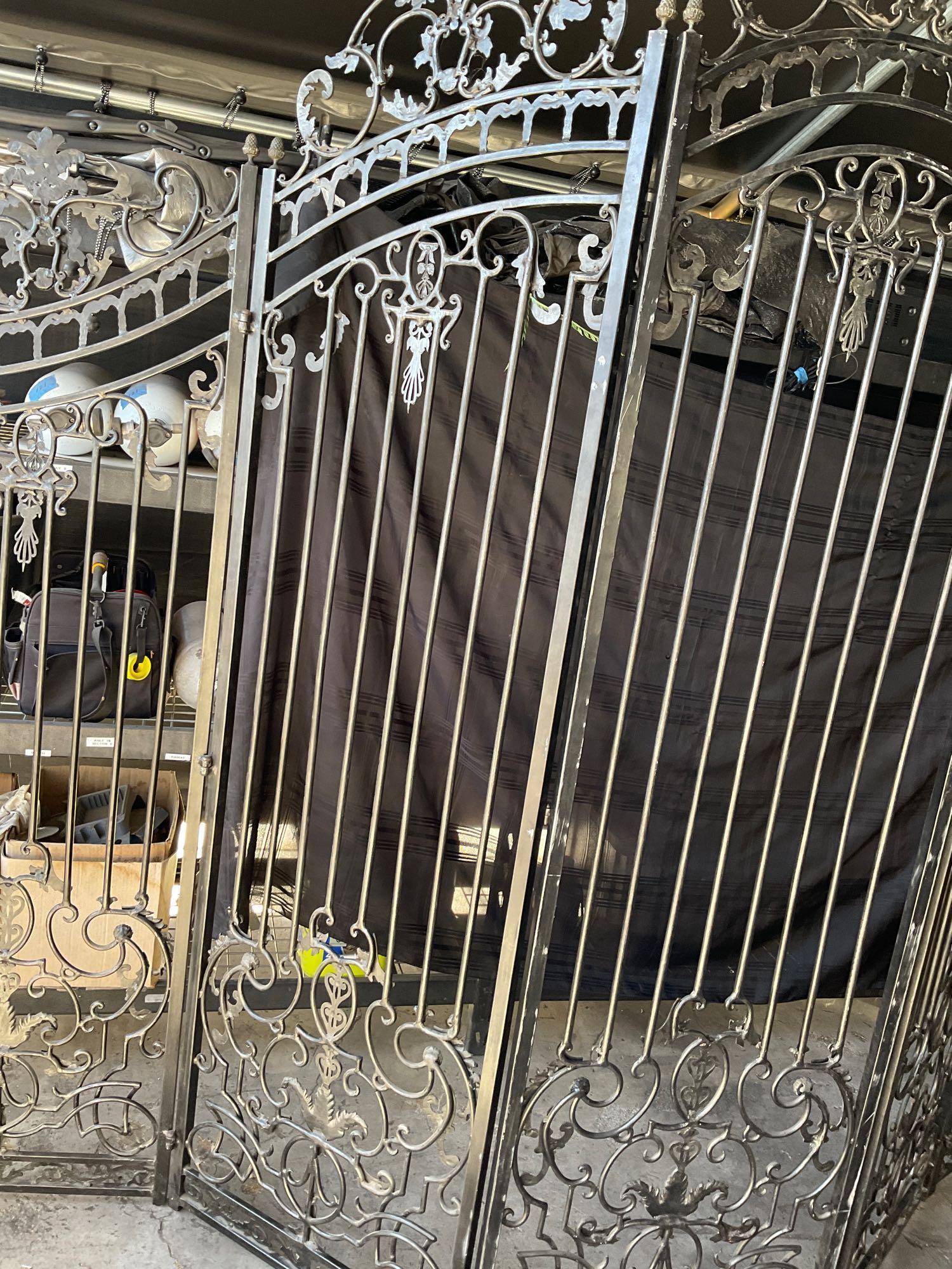 5 panel, foldable, decorative Iron gate. Heavy, 125" W total