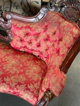 Victorian style couch with two pillows. 3' T x 70" W x 30"D