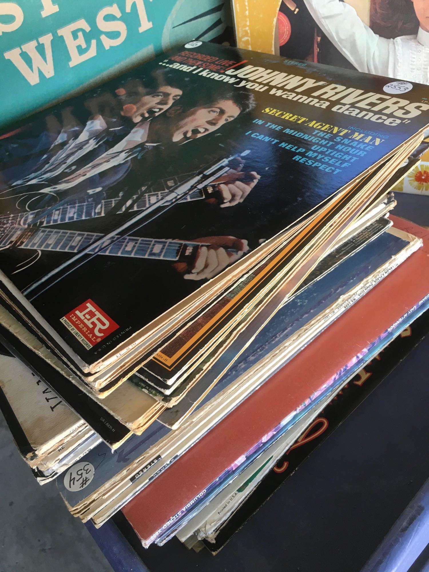 Vintage assorted vinyl records. 235 pieces