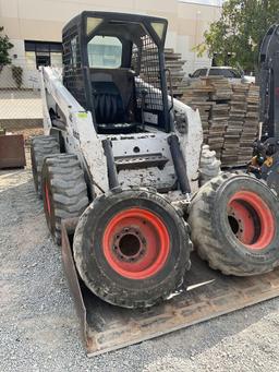 Bobcat S220 Skid Steer, diesel power with set of directional tires, 5587 hours with manual