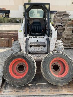 Bobcat S220 Skid Steer, diesel power with set of directional tires, 5587 hours with manual