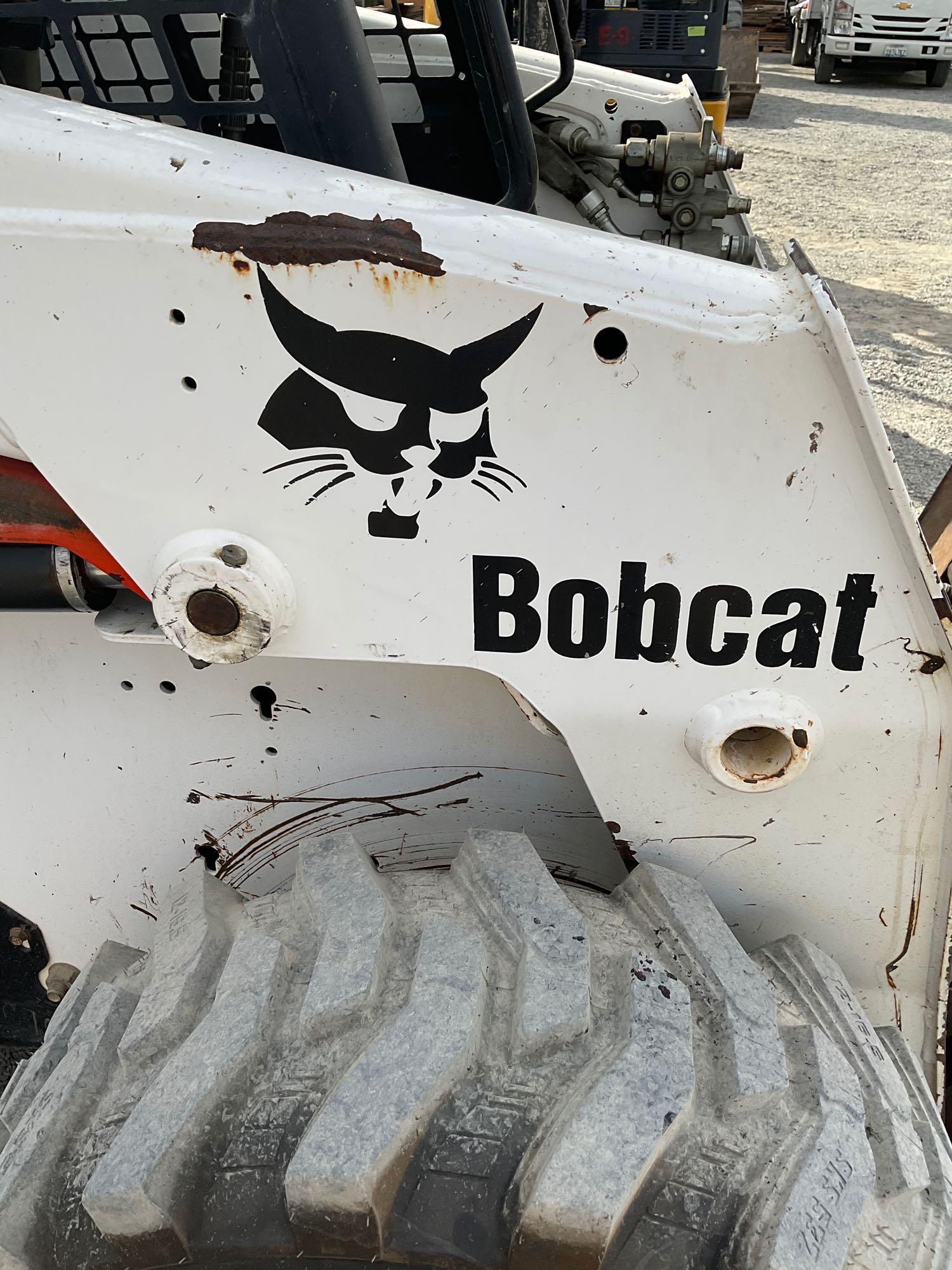 Bobcat S220 Skid Steer, diesel power with set of directional tires, 5587 hours with manual