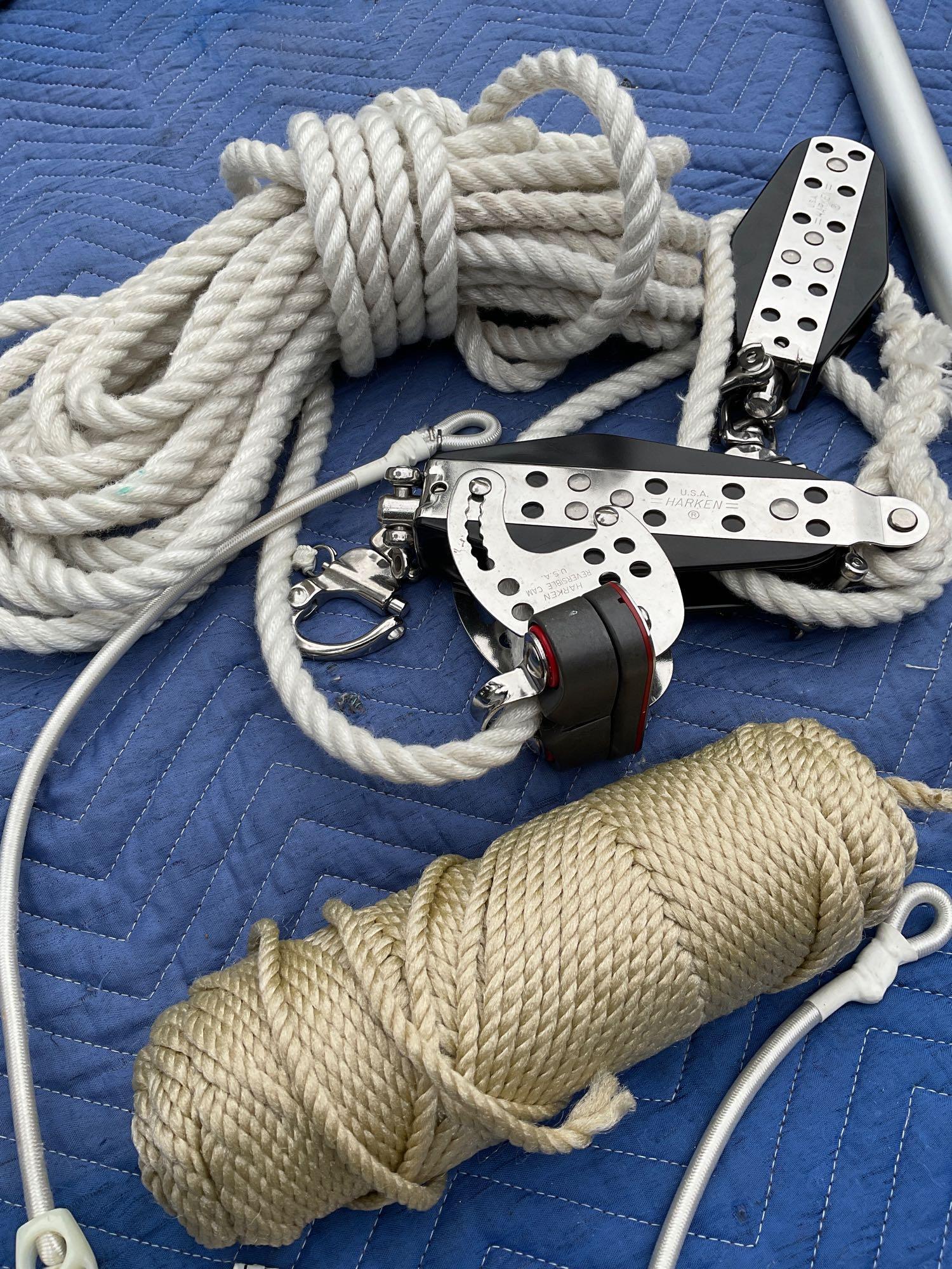 Boat accessories. Nailer boat hook, REI & Wichard harnesses, USA Harken pullies with rope, etc