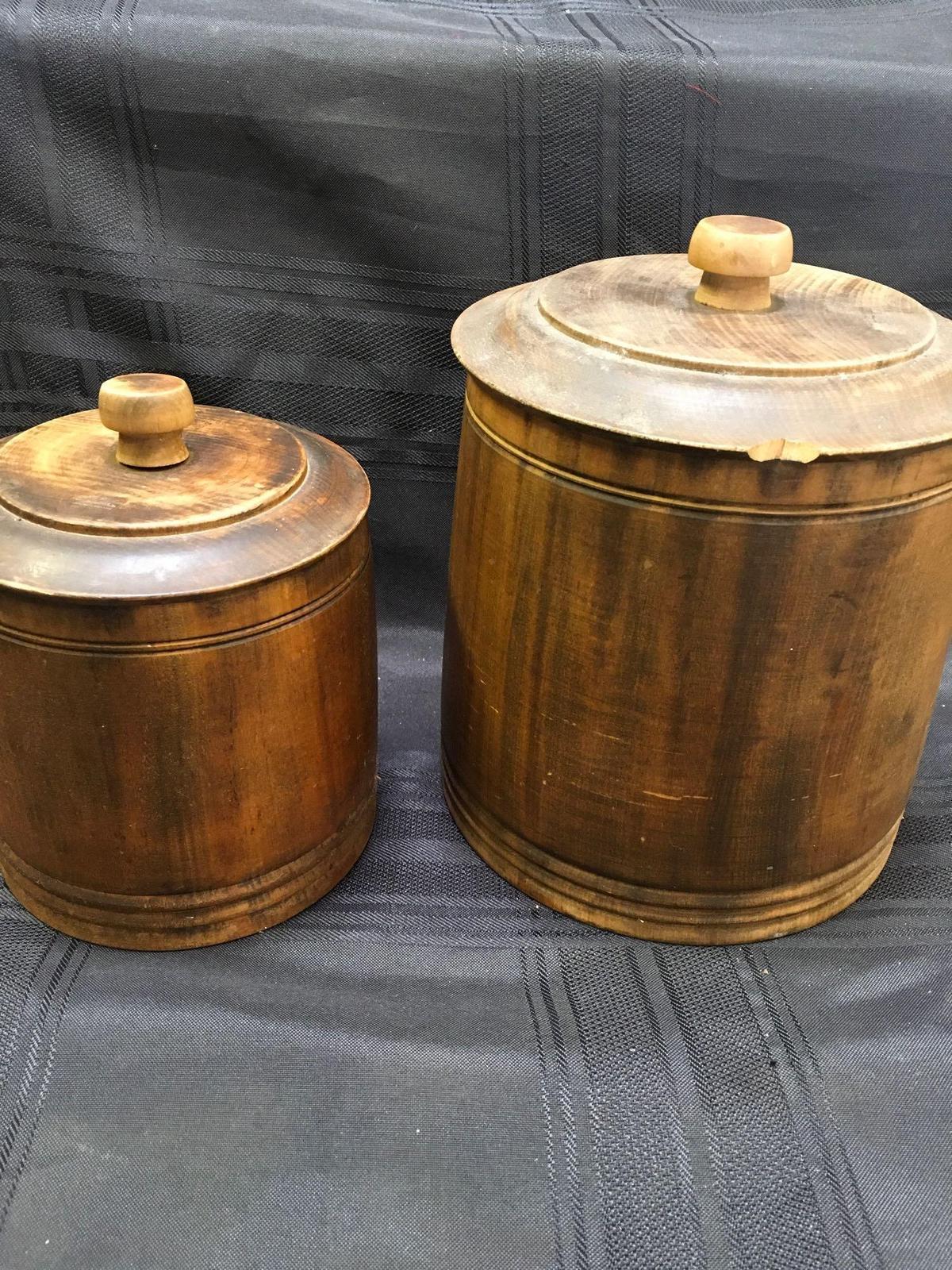 Vintage 7" & 8 1/2" Mort N Morton wood canisters with lids. Both have stamp at the bottom see pics