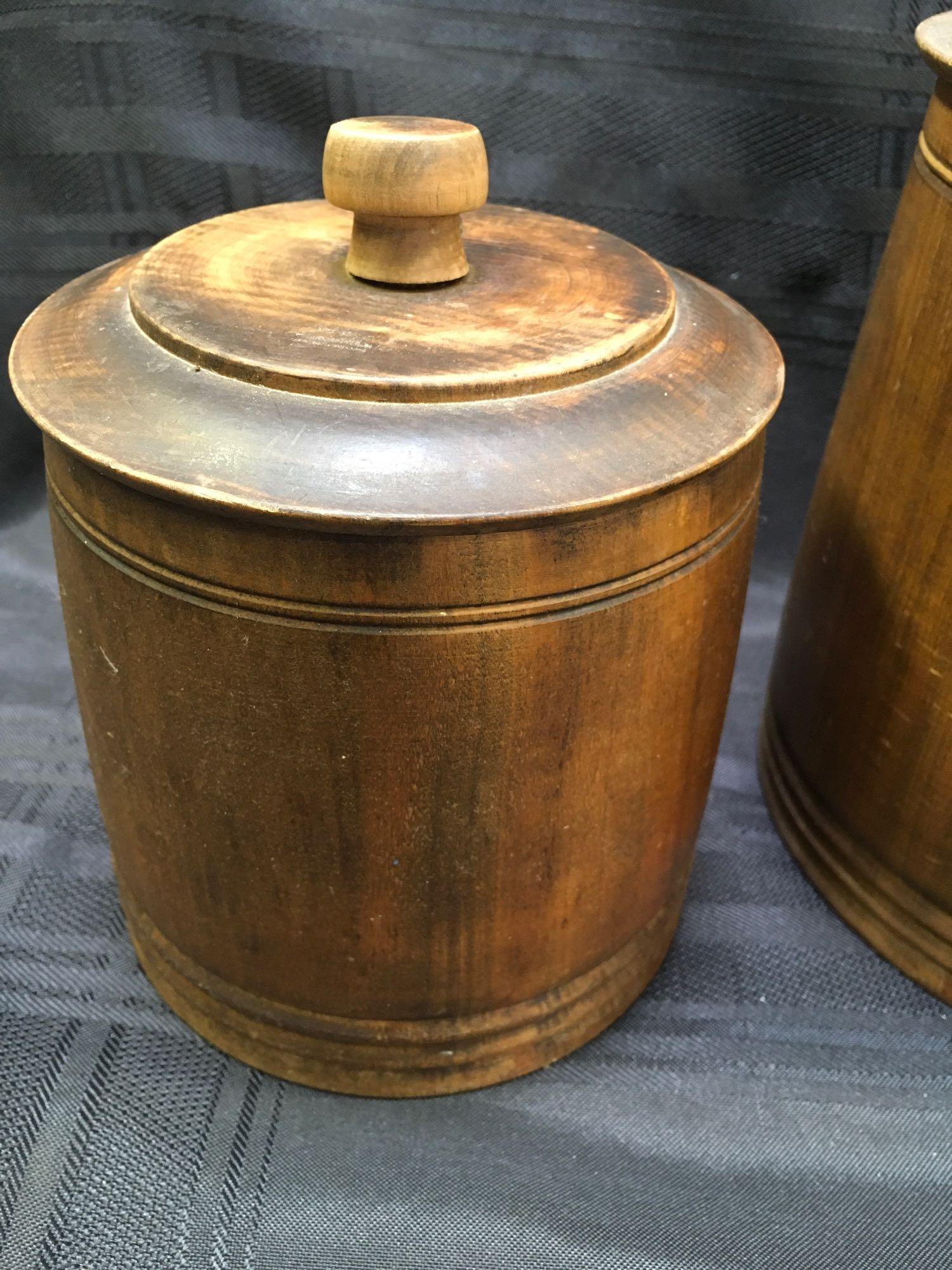 Vintage 7" & 8 1/2" Mort N Morton wood canisters with lids. Both have stamp at the bottom see pics