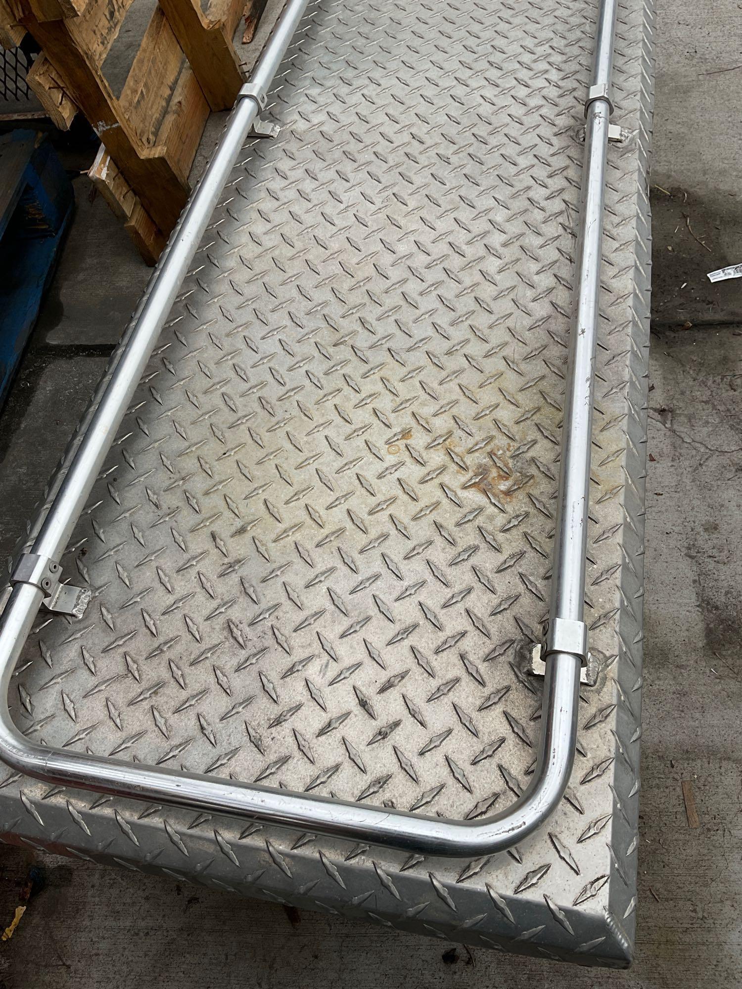 Aluminum Truck Tool box . 17"T x 5' W x 20" D. Inside box there are assorted tents and tools