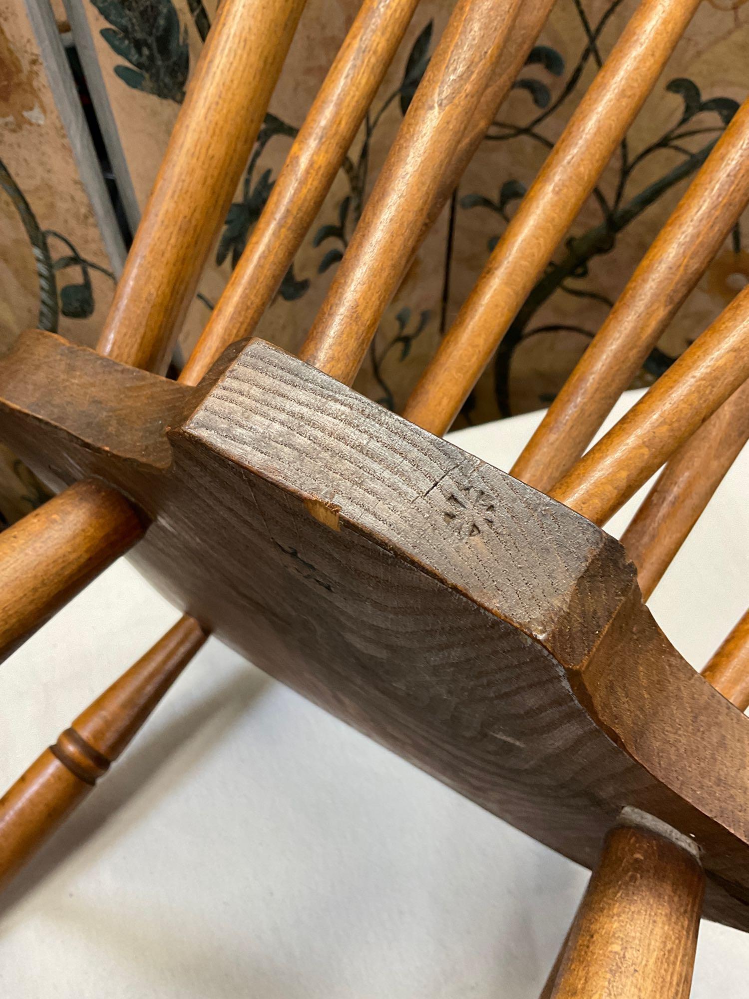 Antique 19th century bow back chair. Stamped either in the back or bottom of chair. See pic