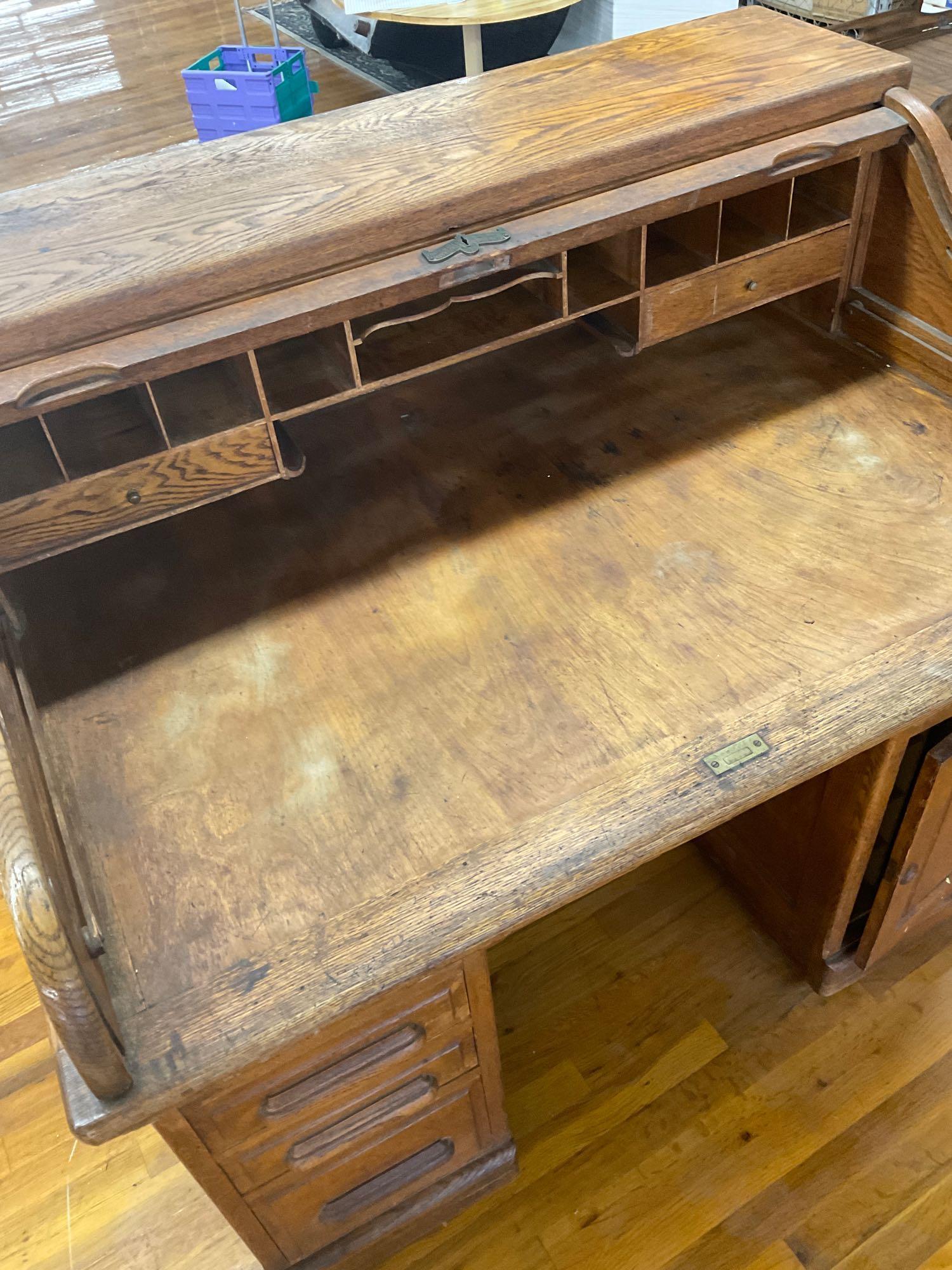 Antique roll top desk by Forest City Furniture Rockford Illinois. 44" x 48" x 34" on casters