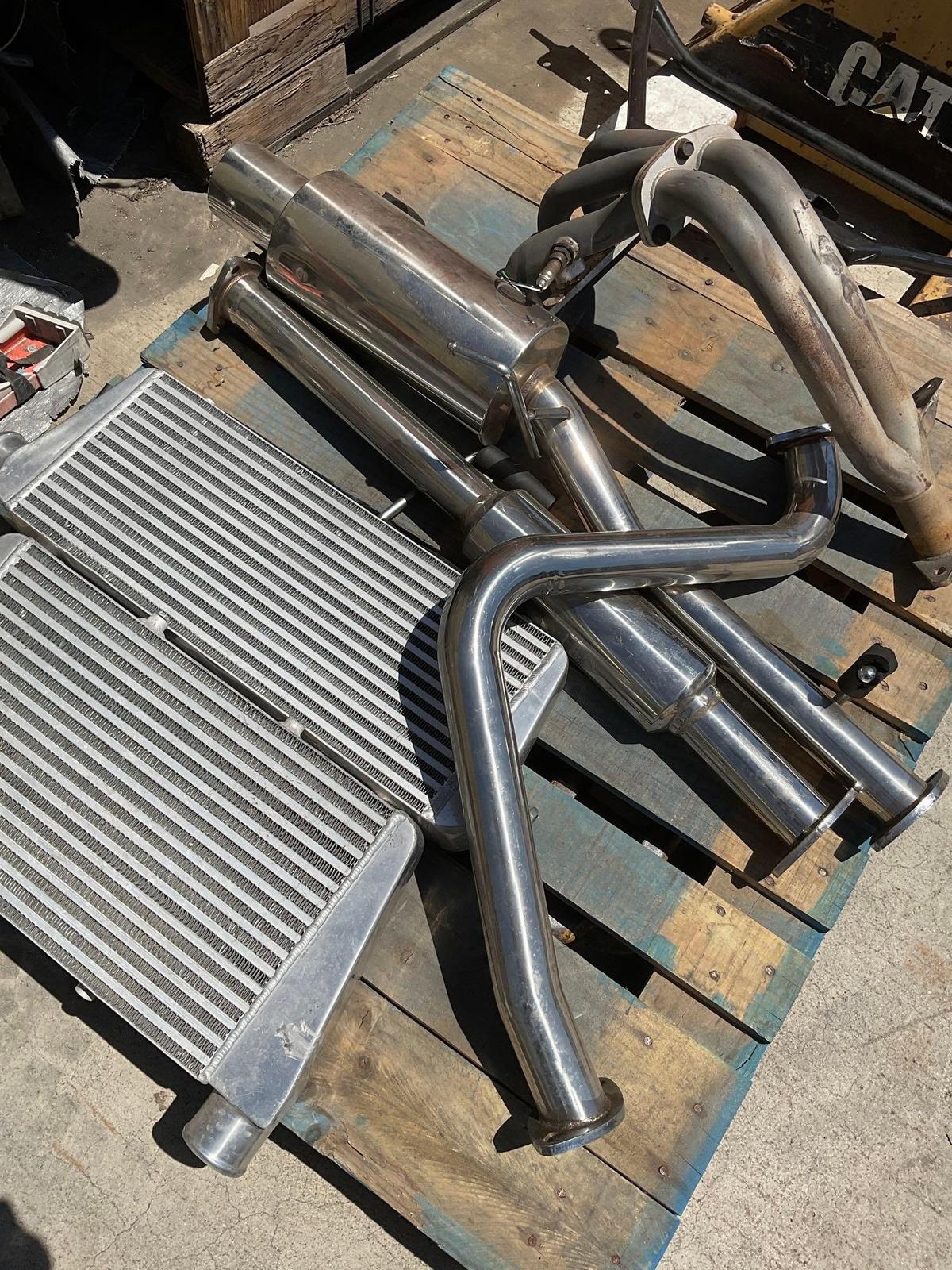 Aluminum Radiators, Headers, Mufflers, Assorted car parts