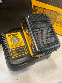 Dewalt reciprocating saw with Battery, Bag, & Charger station ( Works )