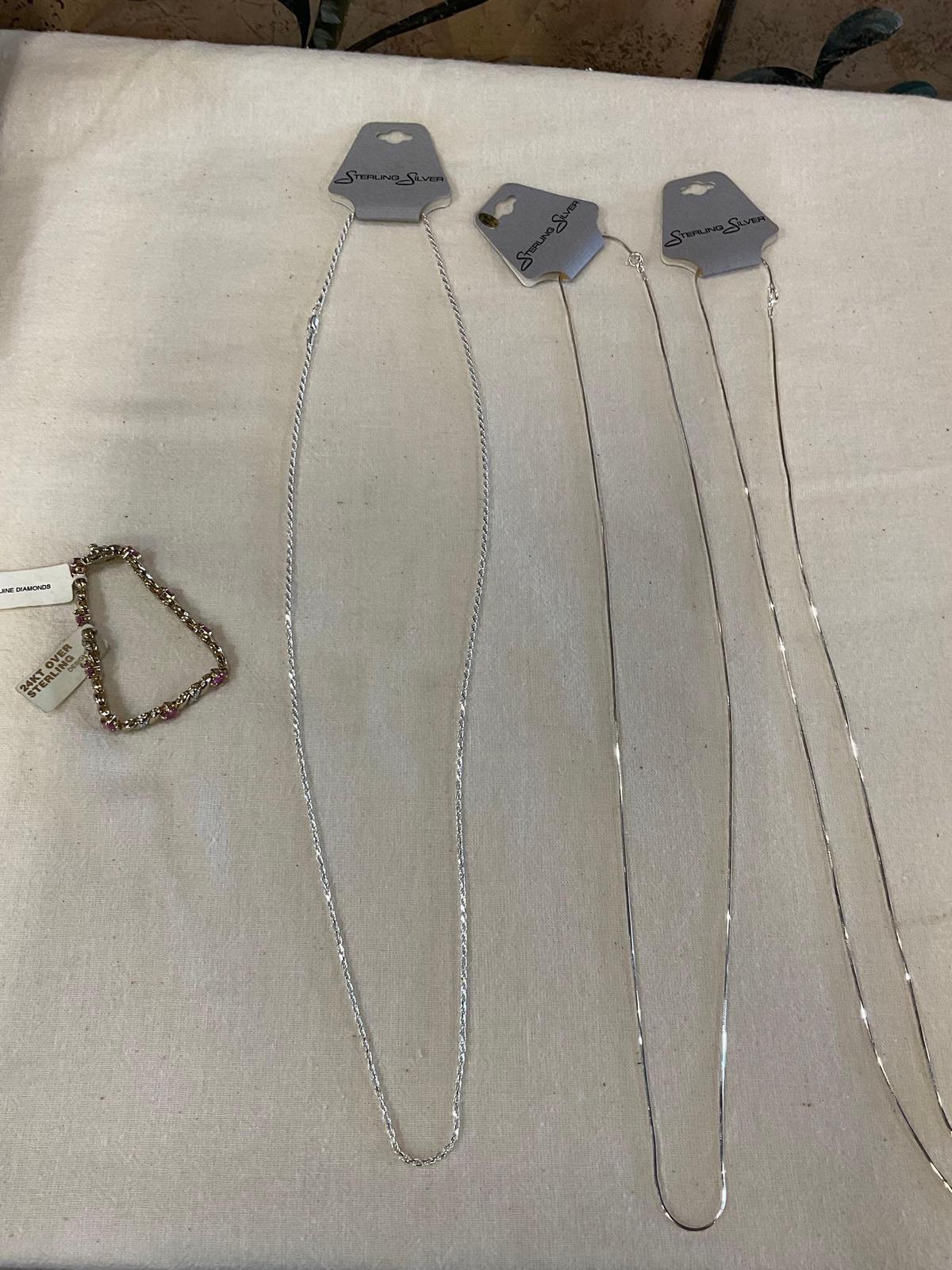 New Costume jewelry. 14? necklaces & Bracelet. 4 pieces