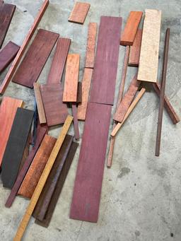 Assorted size and variety of Exotic scrap wood. Over 70 pieces, includes wood trunk 17" x 32" x 16"