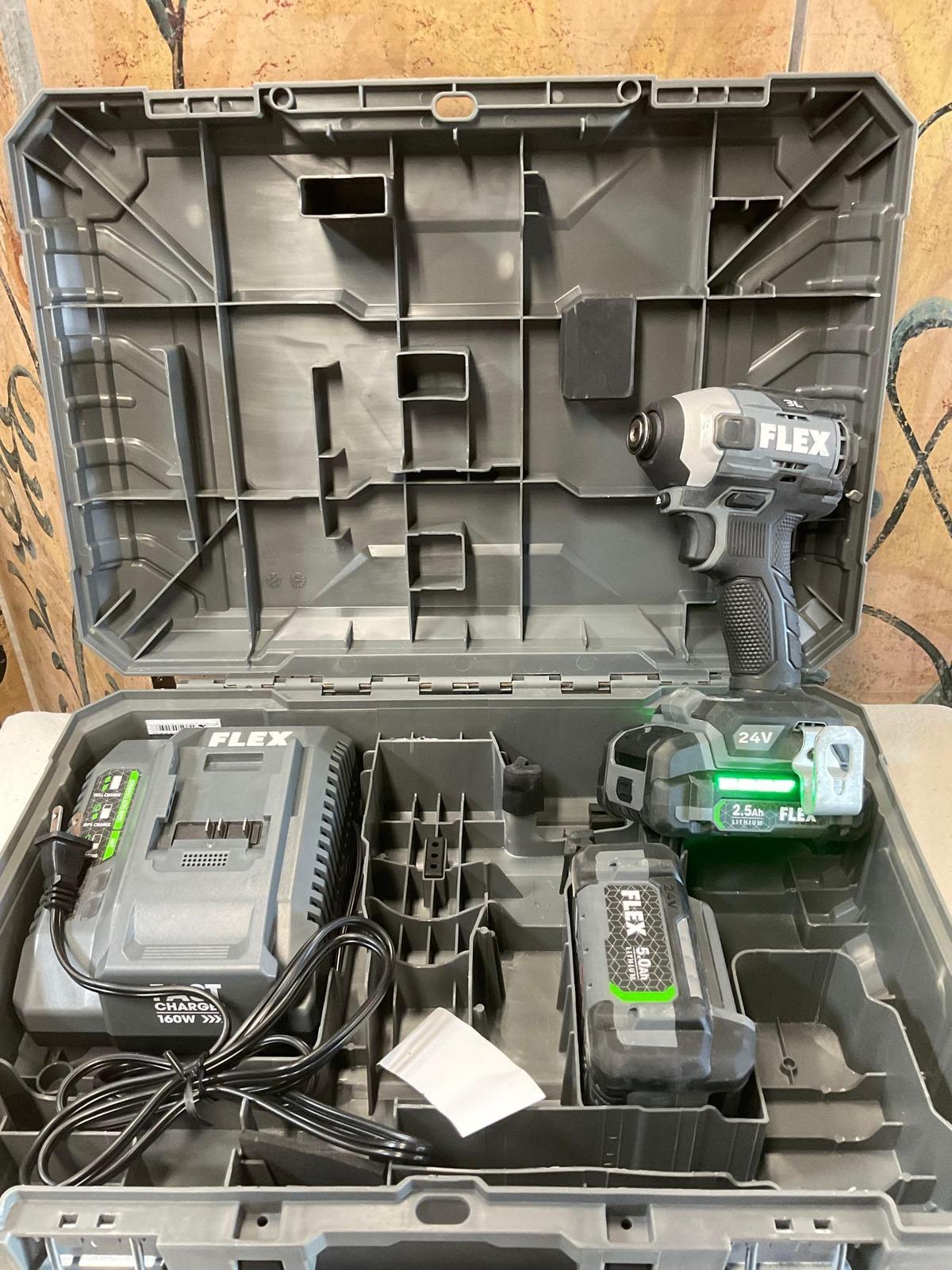 Flex 3L FX1371A impact driver with two batteries, charger station. Turned on with case