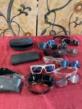 Assorted glasses and cases. 16 pieces