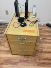 Three drawer file cabinet, ADT, AT & T, & WD units and assorted cords, control, etc