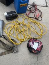 Jumper cables, extension cord, plastic fuel can, heavy duty strap etc. 8 pieces