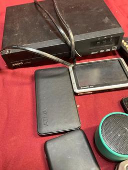 Sanyo DVD player ( turned on, remotes, cells, speakers, etc. 16 pieces