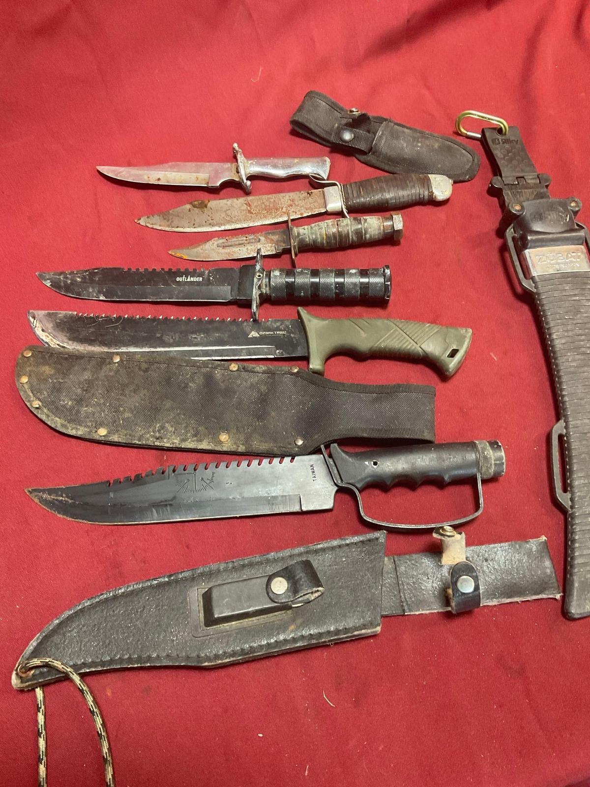 Assorted sheaths, machetes, knives. 10 pieces