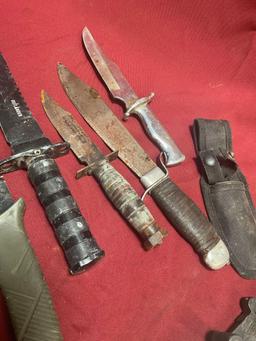 Assorted sheaths, machetes, knives. 10 pieces