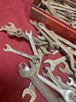 Metal tool box and assorted wrenches. Over 40 pieces