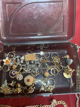 Plastic storage and assorted custom jewelry. Over 50 pieces