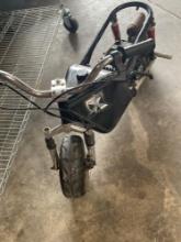 Untested mini bike, emblems are from Genuin Xcooter