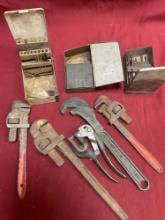 Assorted wrenches, drill bit boxes empty or with missing drill bits, Whitney hand punch. 7 pieces