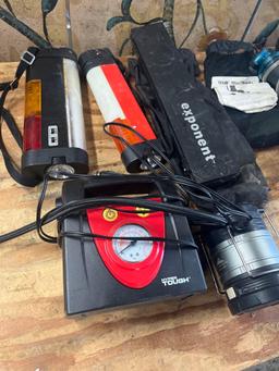 Assorted items. Lights, MSR water filter, inflator, etc. 7 pieces