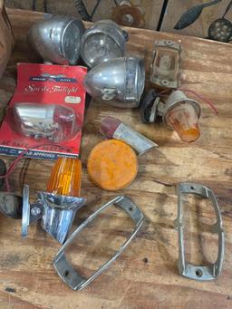 Assorted tail lights. parts, etc. Over 25 pieces