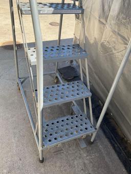 Cotterman 400 lbs max load, 5 step 1 person, rolling ladder. foot pedal not working to lock