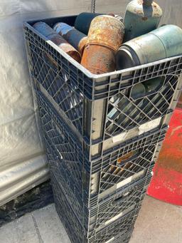 5 plastic crates with propane canister's, some have product