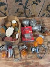 Assorted tail lights. parts, etc. Over 25 pieces