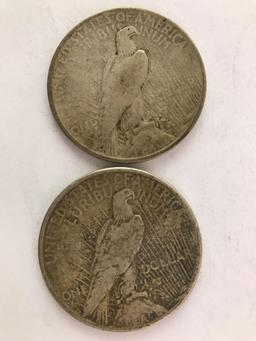 Group of 2 , 1922 peace silver dollar