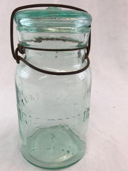 Embossed " Trademark Lightning Putnam 262" Aqua Jar