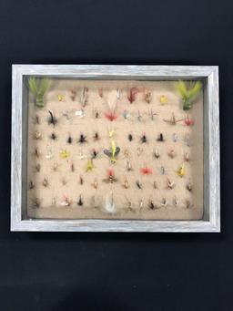 Case with 74 vintage fishing flies