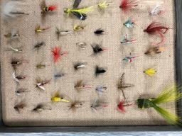 Case with 74 vintage fishing flies