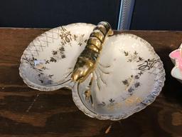 Group of two antique porcelain serving dishes featuring lobster and flowers