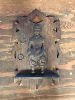 Antique oak wall plaque with Dutch boy