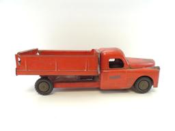 Vintage Structo Toys Red Dump Truck.