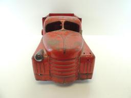 Vintage Structo Toys Red Dump Truck.