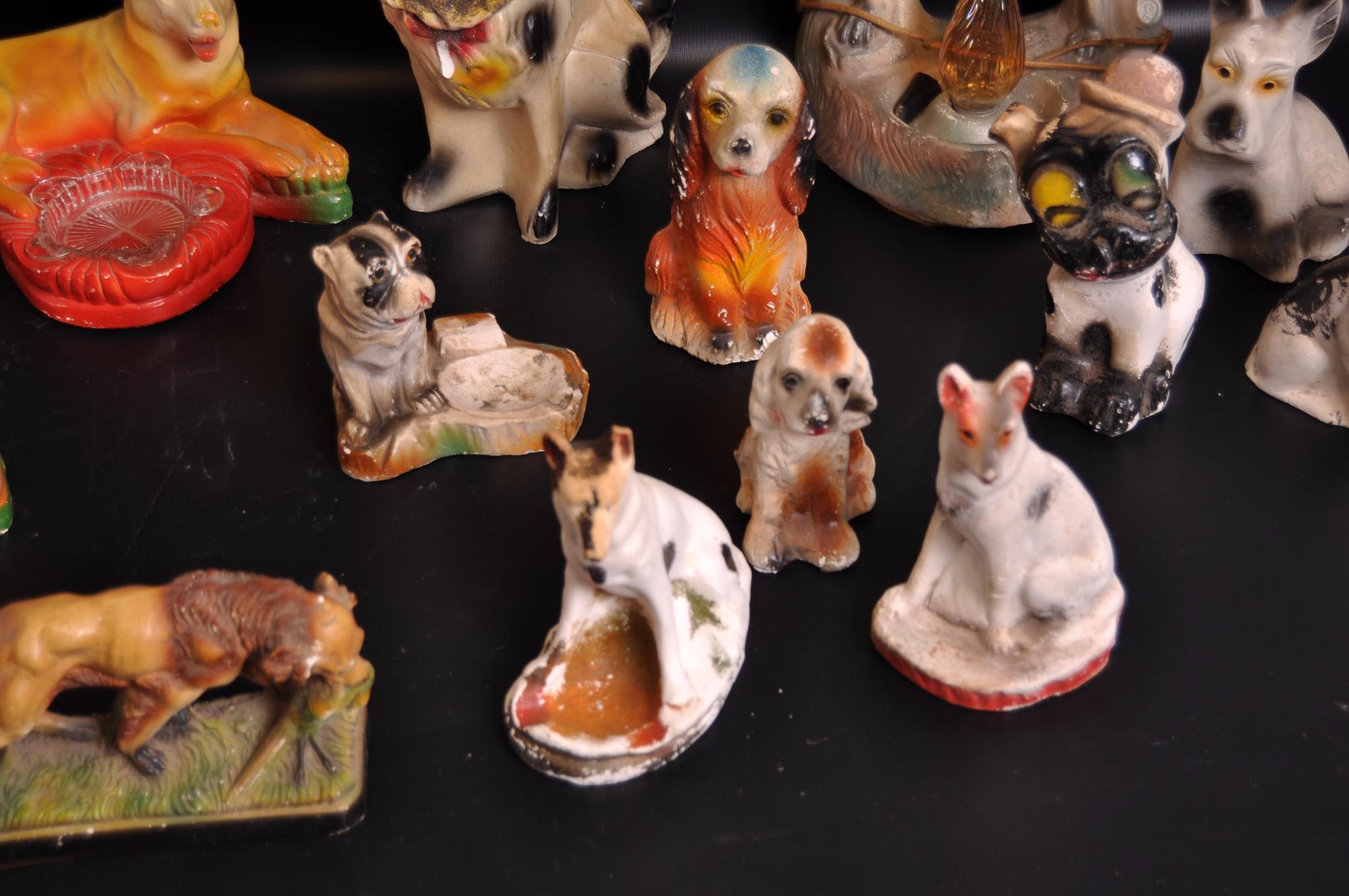 Group of 19 Vintage Carnival Chalk Dog Statues