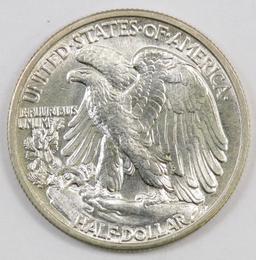 1940 P Walking Liberty Silver Half Dollar.
